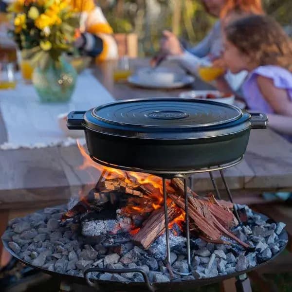 disco essen cocinando a las brazas